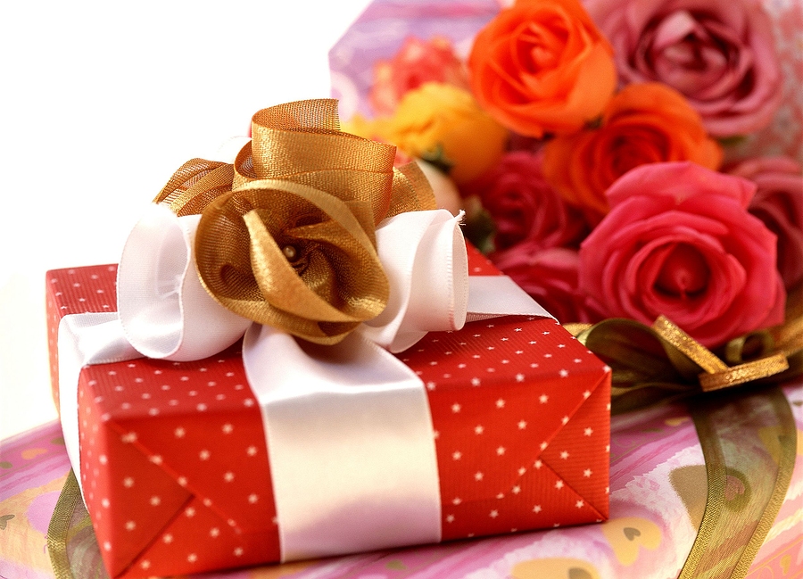 Christmas gift surrounded by decor